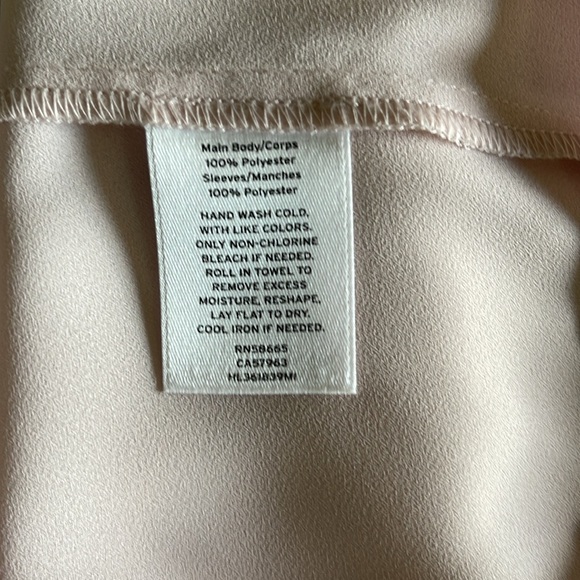 One shoulder blouse with a tiered flutter sleeve. Light pink. Size small. - Picture 7 of 8